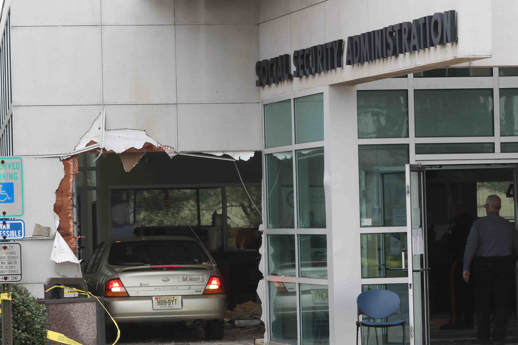 Car crash through Social Security Building